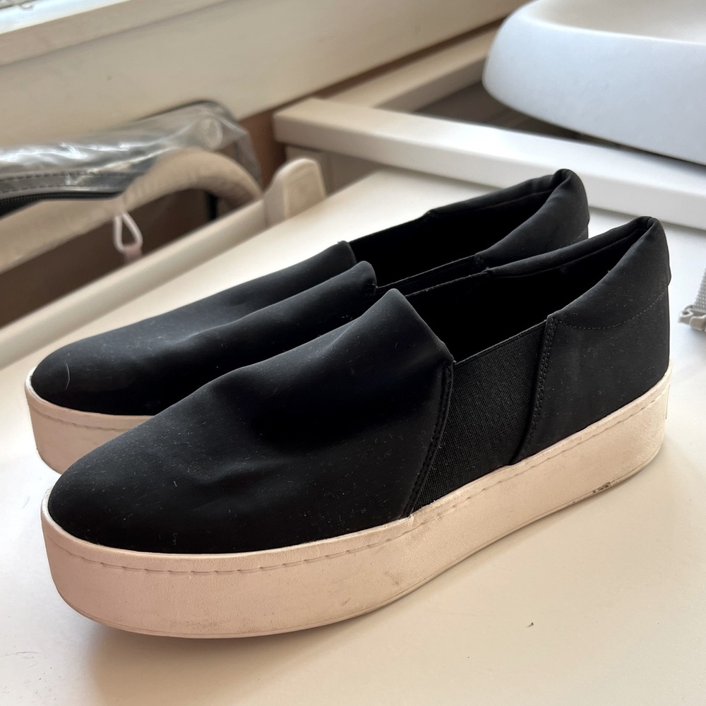 Vince black slip ons
